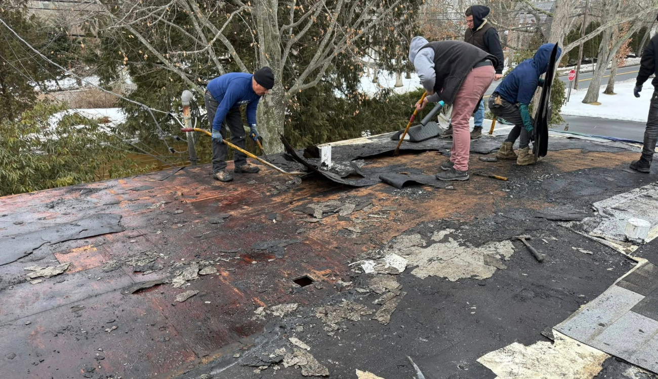 The tear-off phase of a roof replacement