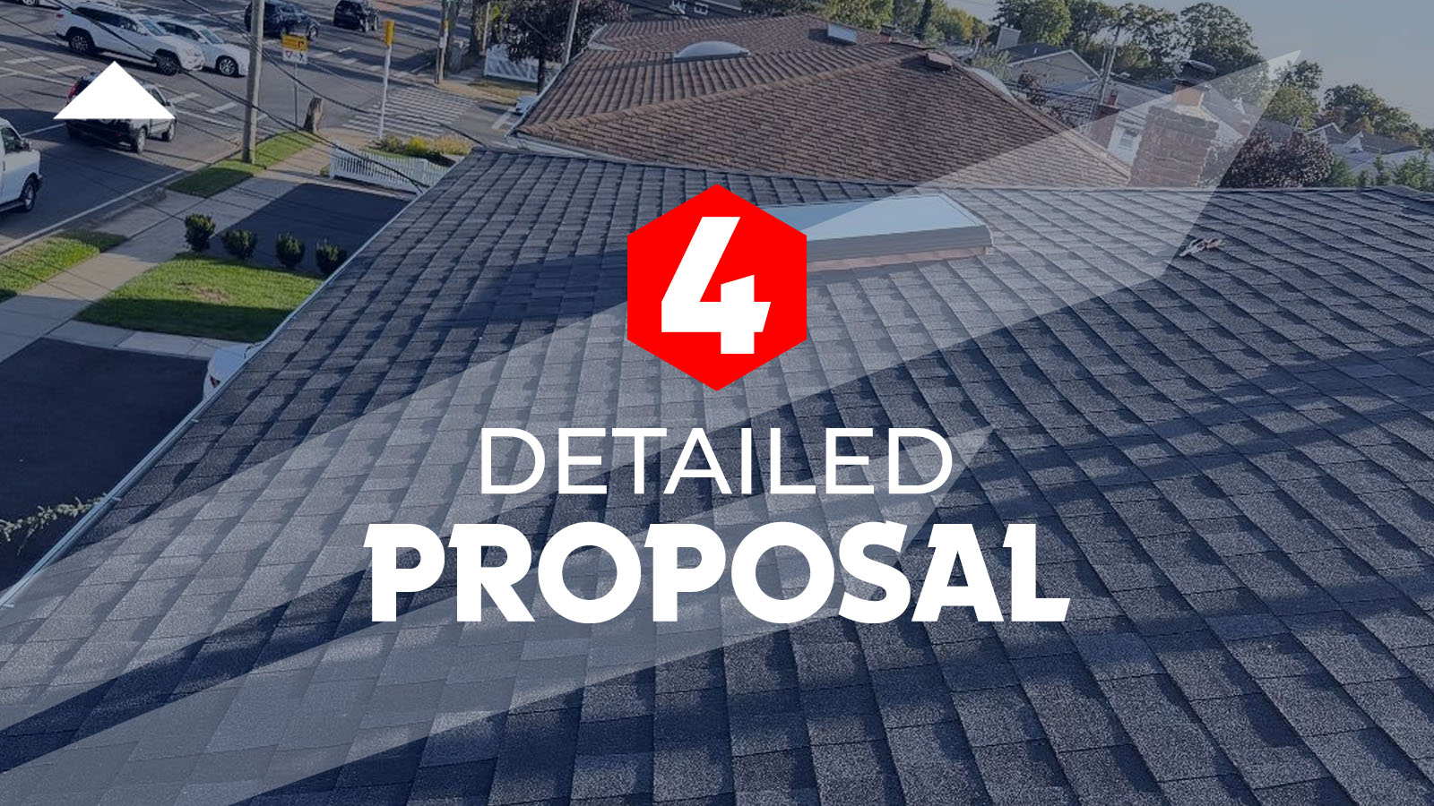 Dark, multi-tonal shingle roofing for steps, a home is visible, featuring a skylight. Beyond the roofline, a residential street with parked cars and other houses with brown-toned roofing can be seen.