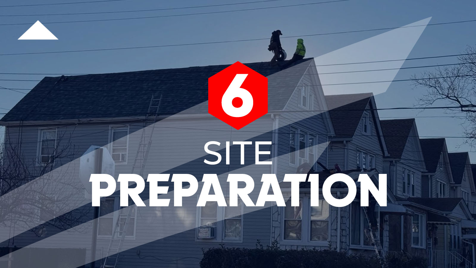 Front shot for steps, shows several workers performing site preparation on the dark roofing of a residential building. The background features a row of similar multi-story homes under a clear, dim sky.